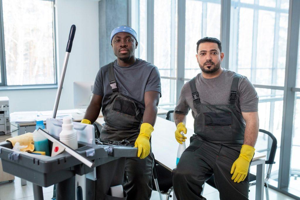 medium shot workers with cleaning cart 23 2149345519
